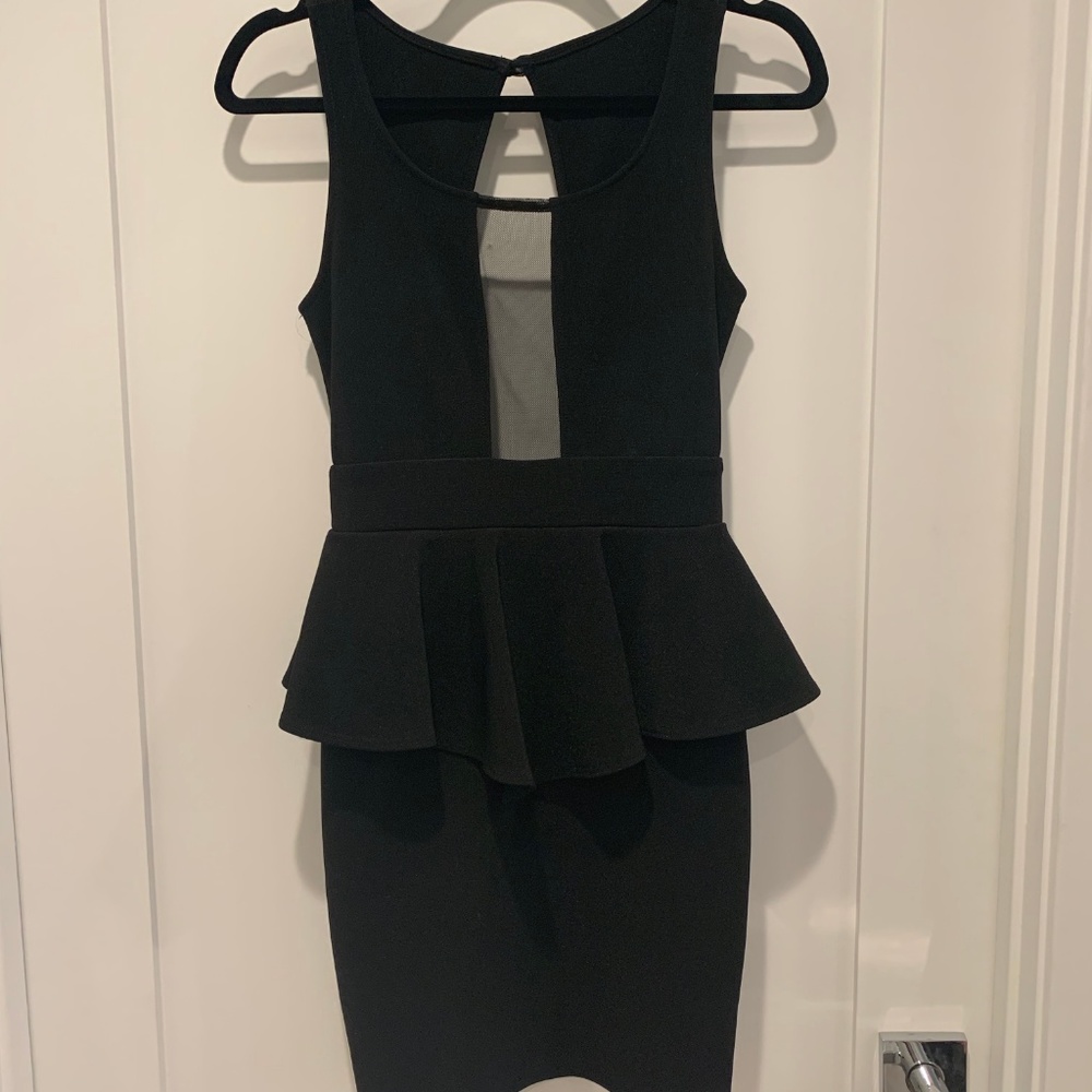 Black peplum waist dress with mesh detail